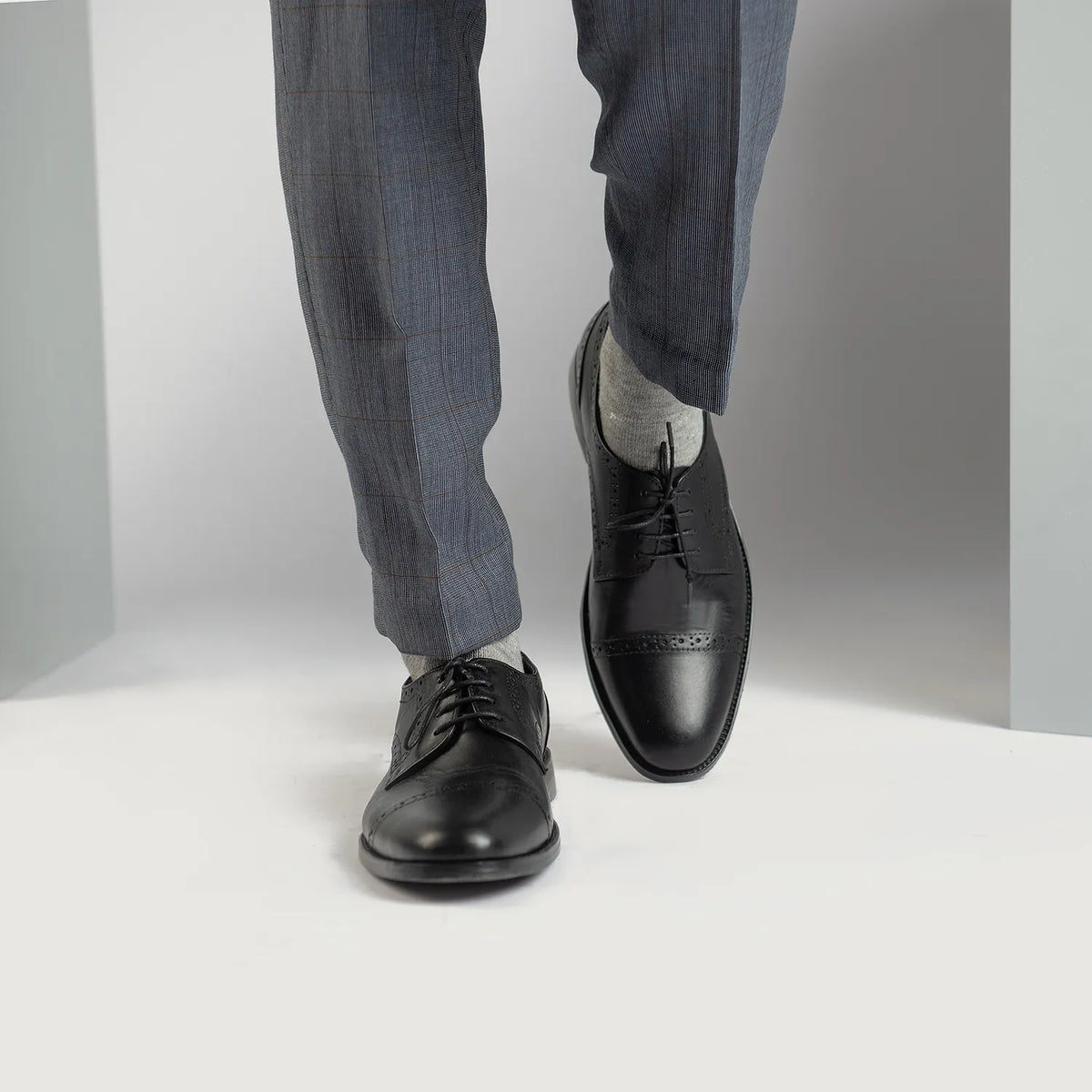 Styled On-Foot Perspective Demonstrating Ankle Fit & Silhouette on Model