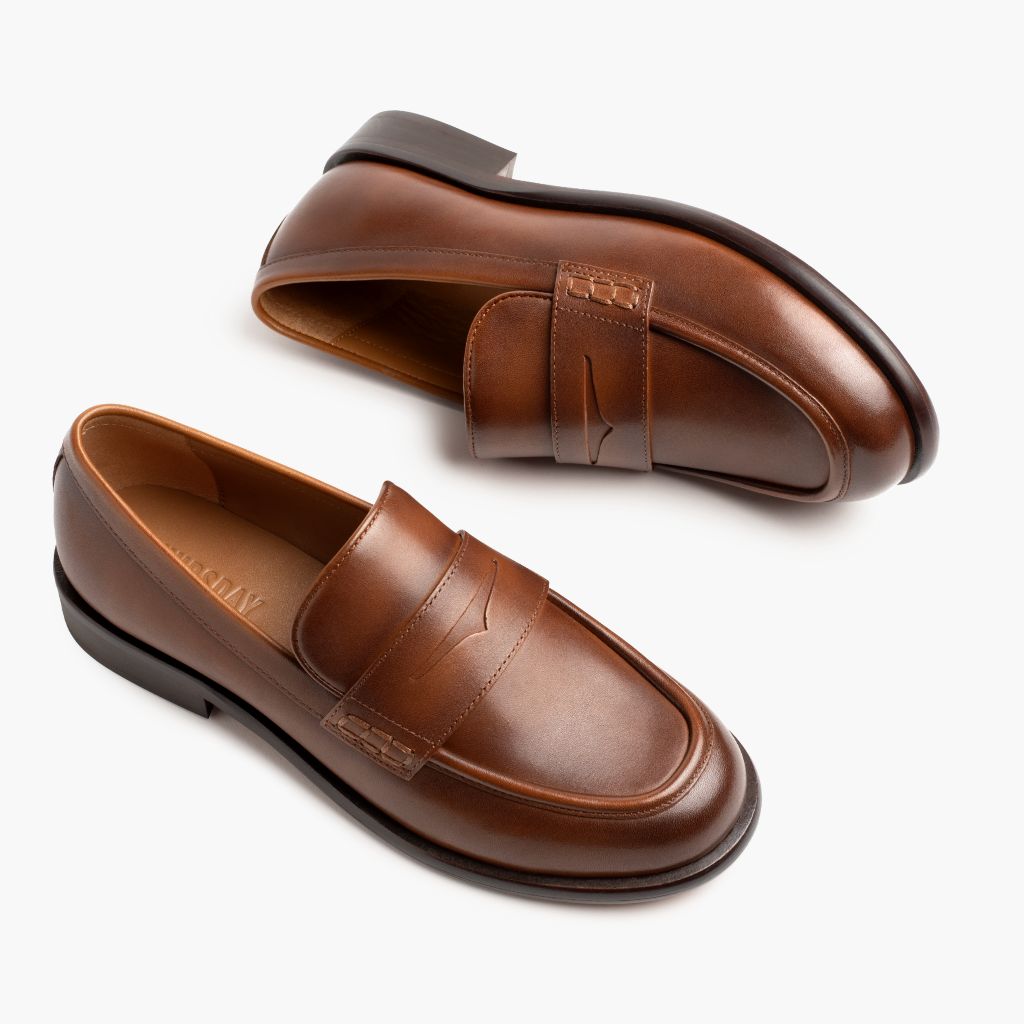 High-Traction Rubber Outsole & Lug Tread Pattern on Dress Penny Pecan Stivali in pelle da Donna