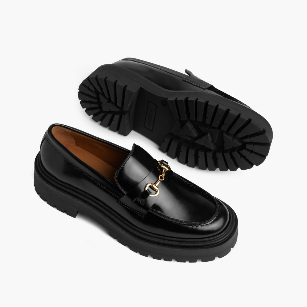 High-Traction Rubber Outsole & Lug Tread Pattern on Penny Platform Nero & Gold Mocassini in pelle da Donna