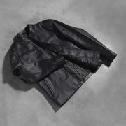 Styled Fit Perspective of Austere Matte Nero Giacca Biker in Pelle da Uomo on Model - Natural Daylight Drape