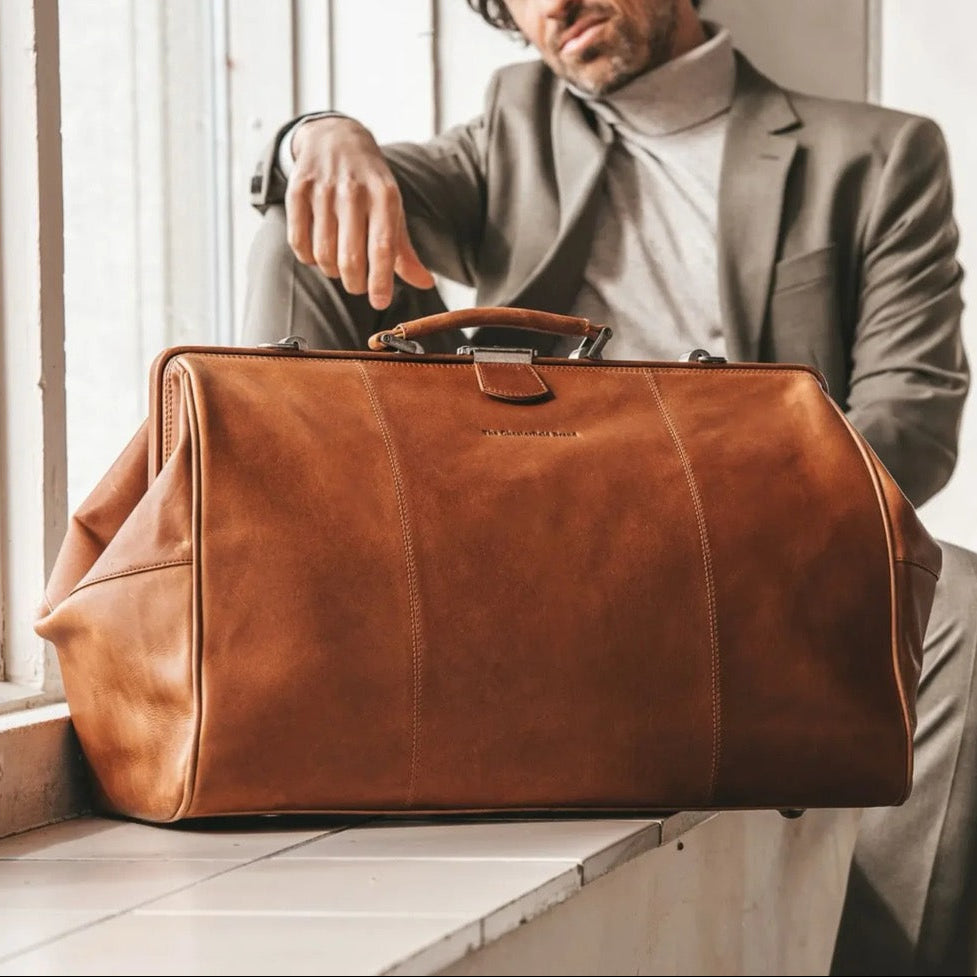 Classic 100% Full-Grain Leather Duffle Bag - Rear Perspective Showing Reinforced Leather Straps &amp; Stitching