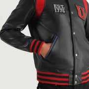Dettaglio ravvicinato of Varsity &amp; Snap Button Hardware on Liberte USA Black Leather Varsity Jacket