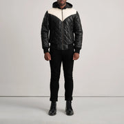 
Norman Tan Hooded Bomber Leather Puffer Jacket - Vista laterale che mostra il taglio ergonomico delle maniche