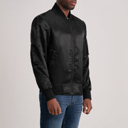 
Black Satin Bomber Jacket - Vista posteriore con spalle definite e orlo pulito
