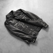 Button &amp; Hem Craftsmanship Construction Detail on Men's Ranchson Nero Leather Shirt da Uomo